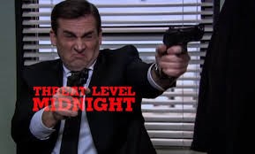 A person holding a gun
Description automatically generated with medium confidence